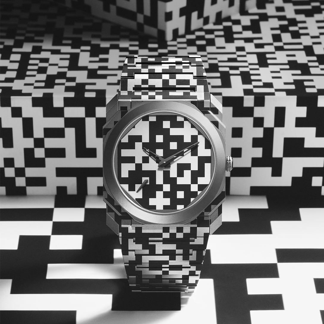 Octo Finissimo Dazzle against a graphic background inspired by its laser-engraved geometric pattern.