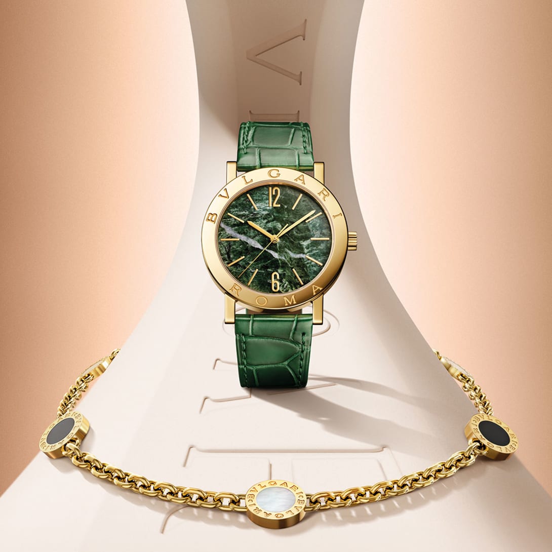 Bvlgari Bvlgari watch with yellow gold case and green marble dial, and Bvlgari Bvlgari necklace.