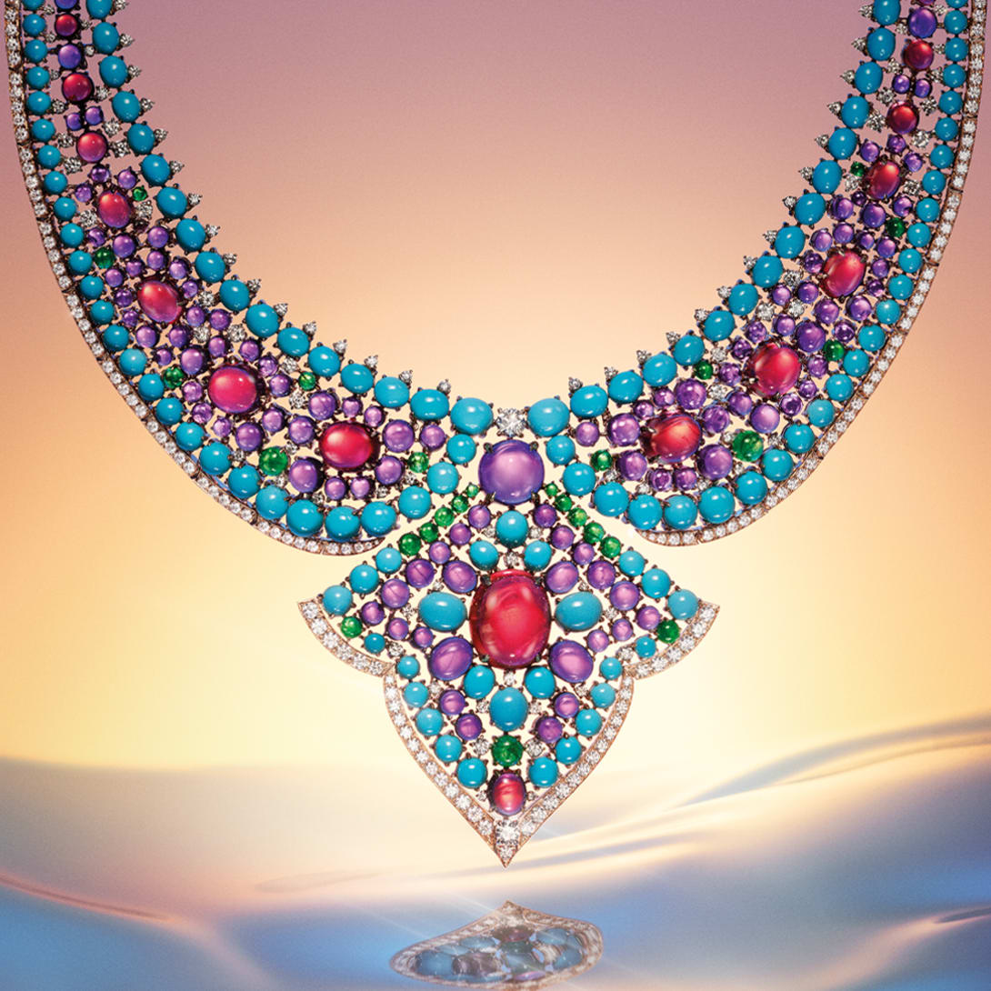 Model wearing The Bvlgari Lotus Cabochon High Jewellery necklace, close-up.