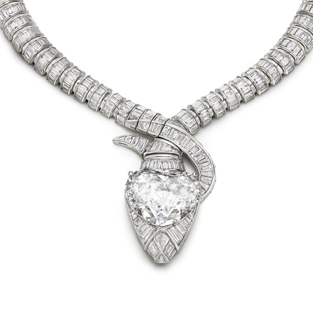 Serpenti Imperial Heart High Jewellery white gold necklace with diamond on the snake's head and diamond pavé.