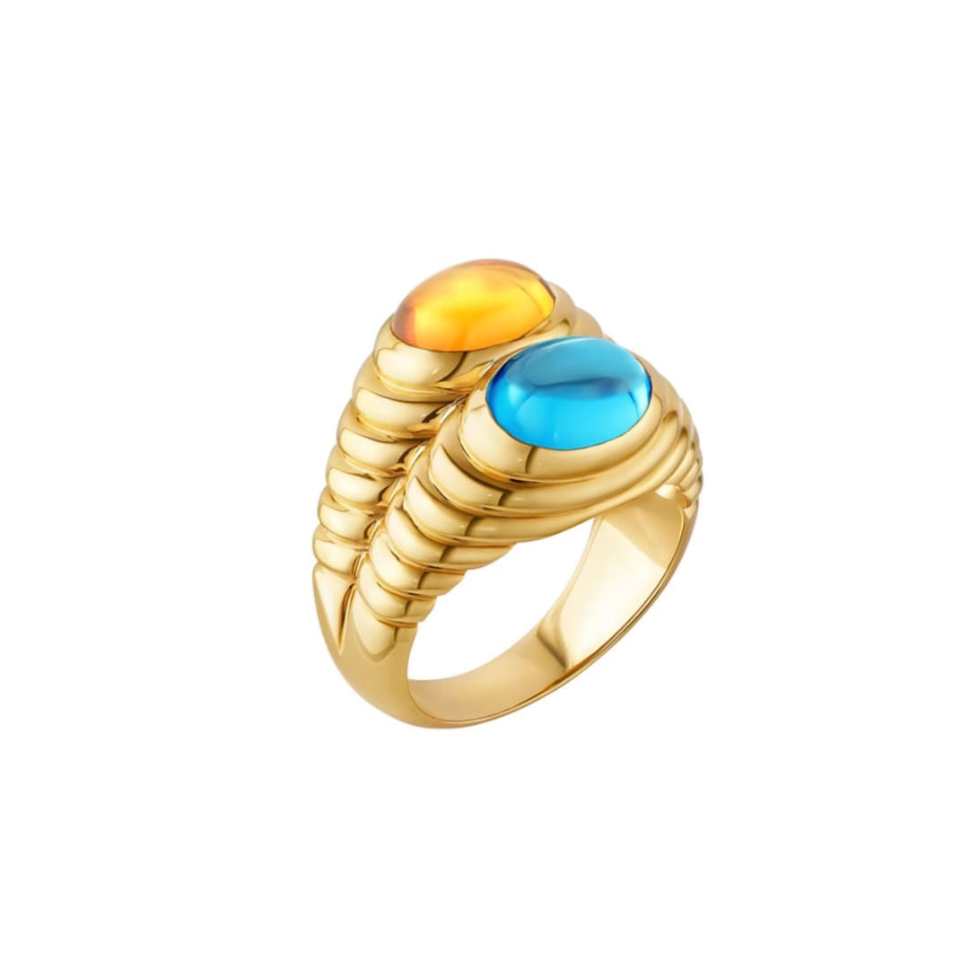 Doppio Baccellato 18 kt yellow gold ring set with oval cabochon-cut blue topaz and citrine quartz.