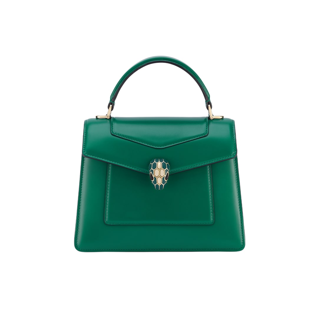 Serpenti Forever medium top handle bag in Smeraldo Prezioso calf leather with violet amethyst nappa leather lining.