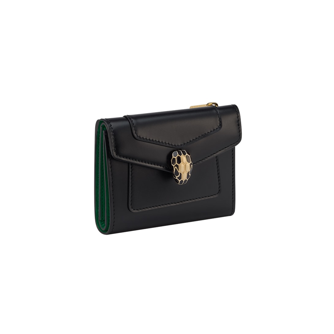 Serpenti Forever compact wallet in black calf leather with emerald green nappa leather interior.