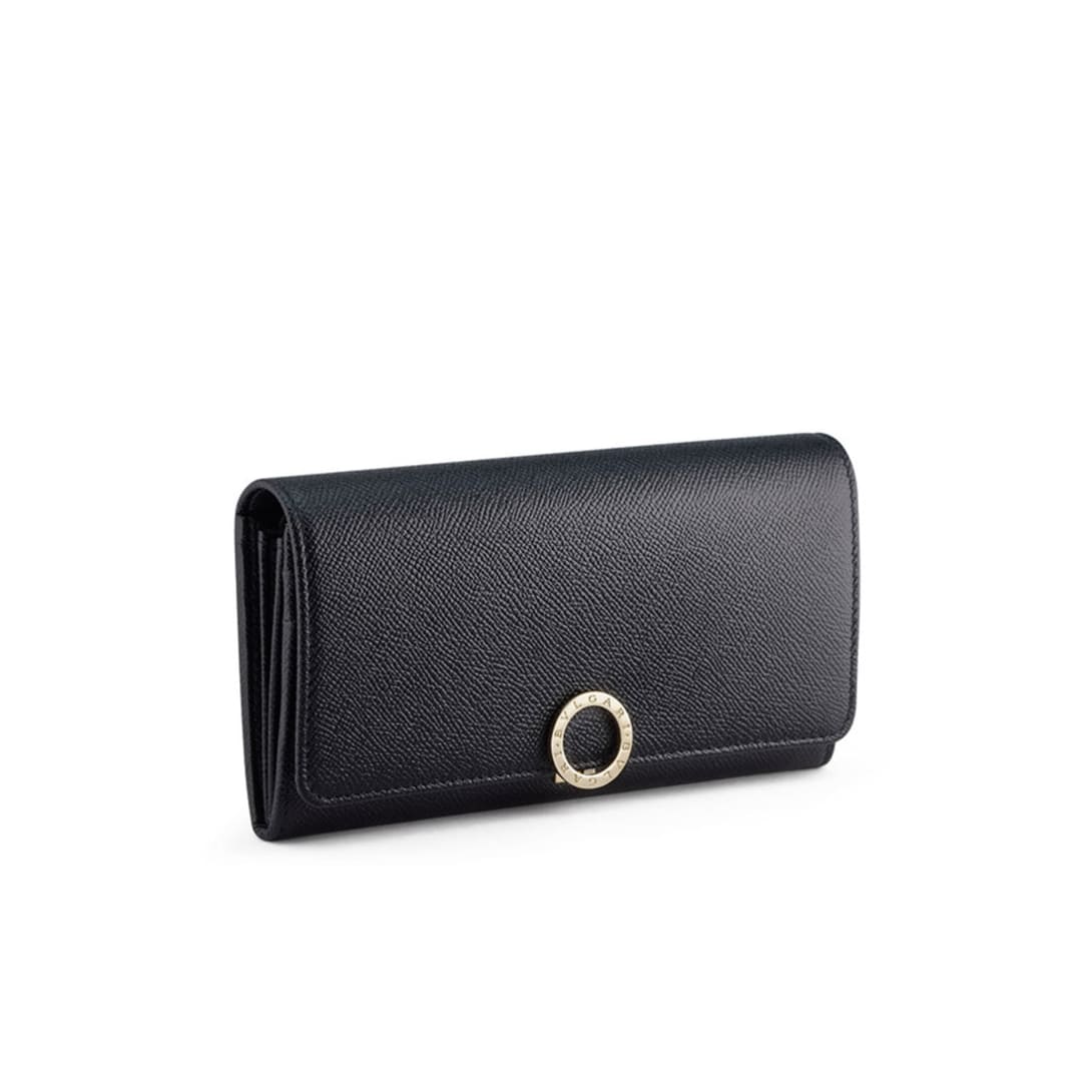 Serpenti Cuore 1968 top handle bag in royal ruby calf leather with royal ruby nappa leather lining.