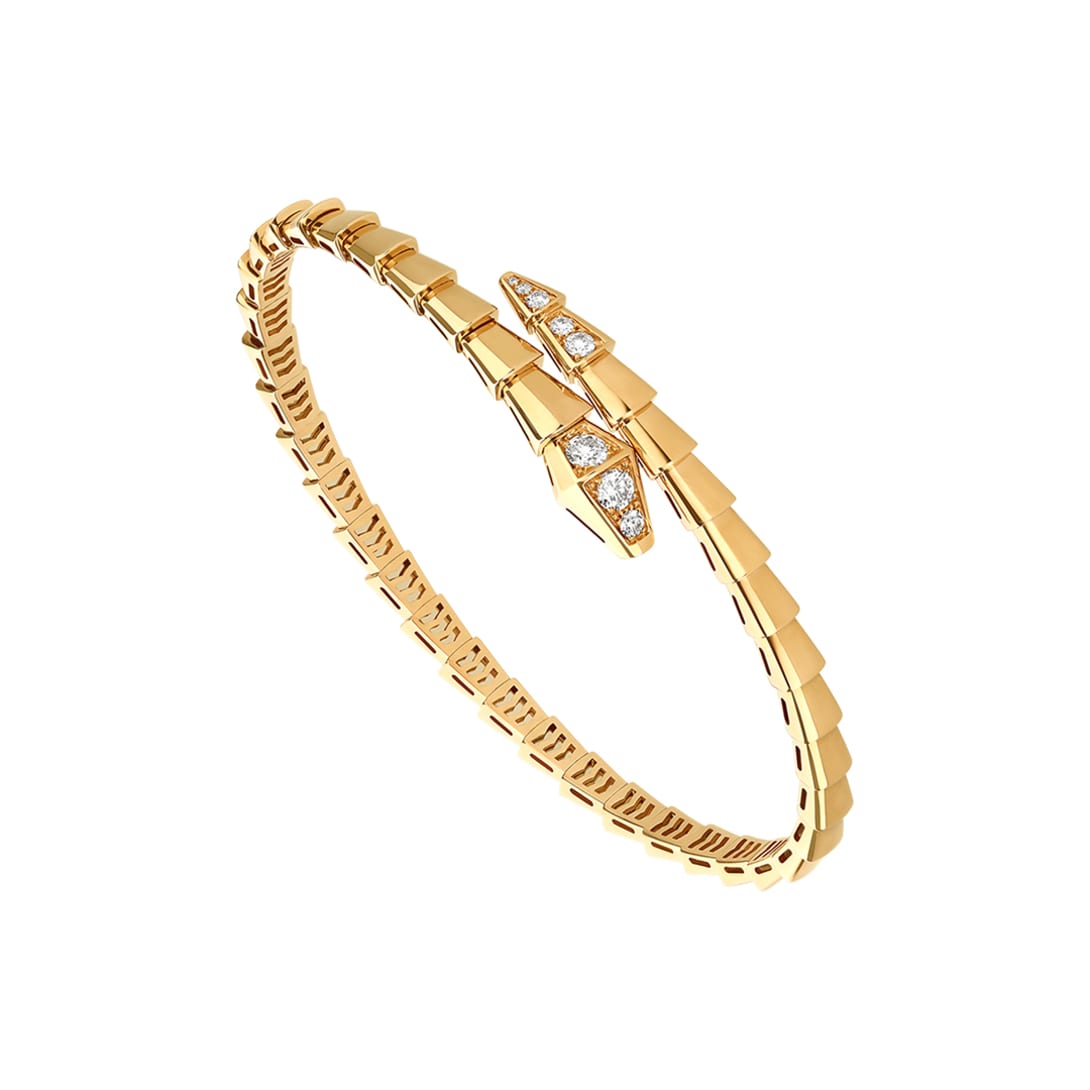 Serpenti Viper one-coil 18 kt yellow gold bracelet set with pavé diamonds on the head and tail.