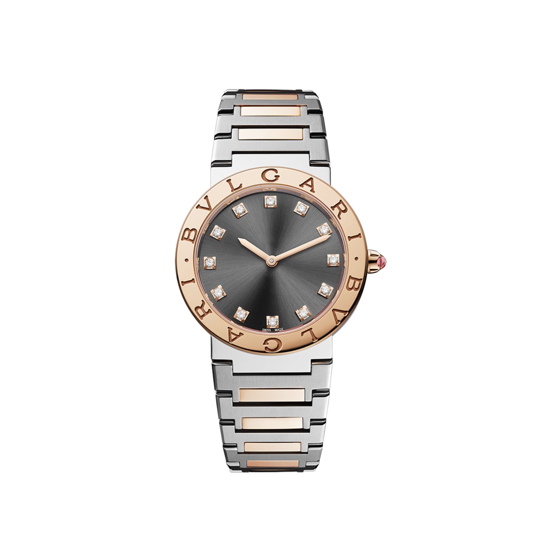 Bvlgari Bvlgari Lady watch with quartz movement, 33 mm stainless steel case, 18 kt rose gold bezel engraved with double logo.