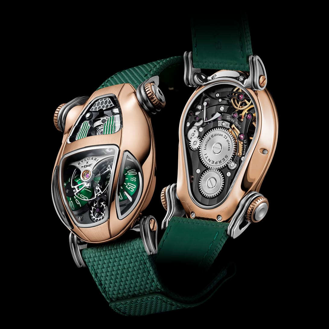 Bvlgari x MB&F Serpenti watch with rose gold case, green domes and green rubber strap, close up.