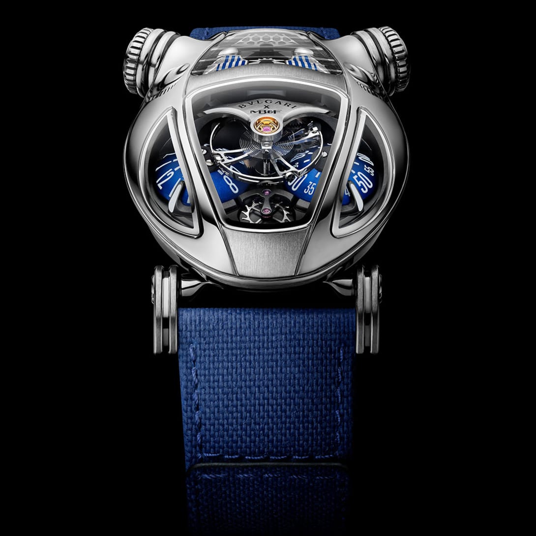 Bvlgari x MB&F Serpenti watch with titanium case, blue domes and blue rubber strap, front view.