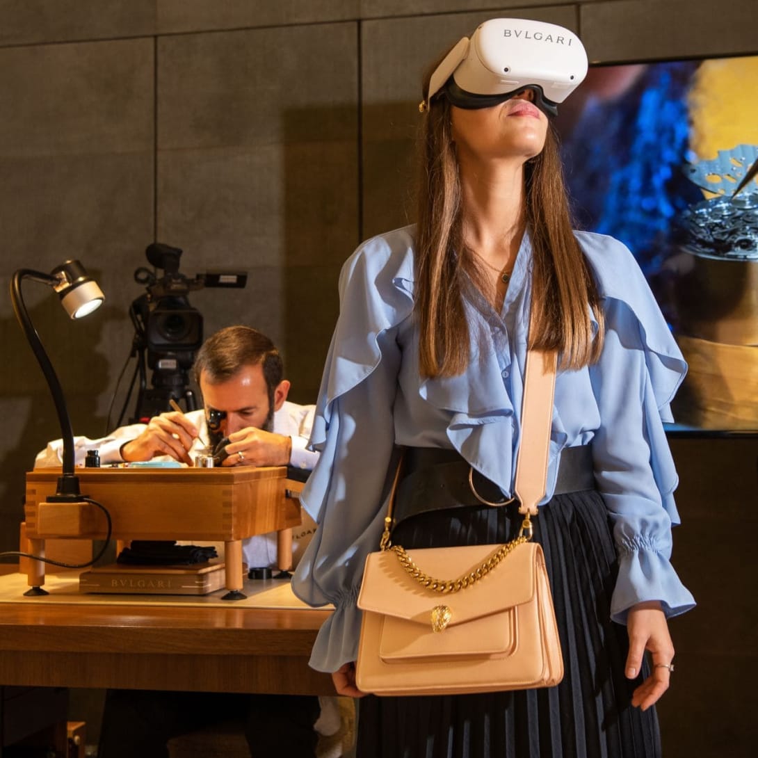 Woman wearing a Virtual Reality Headset during a Bulgari event