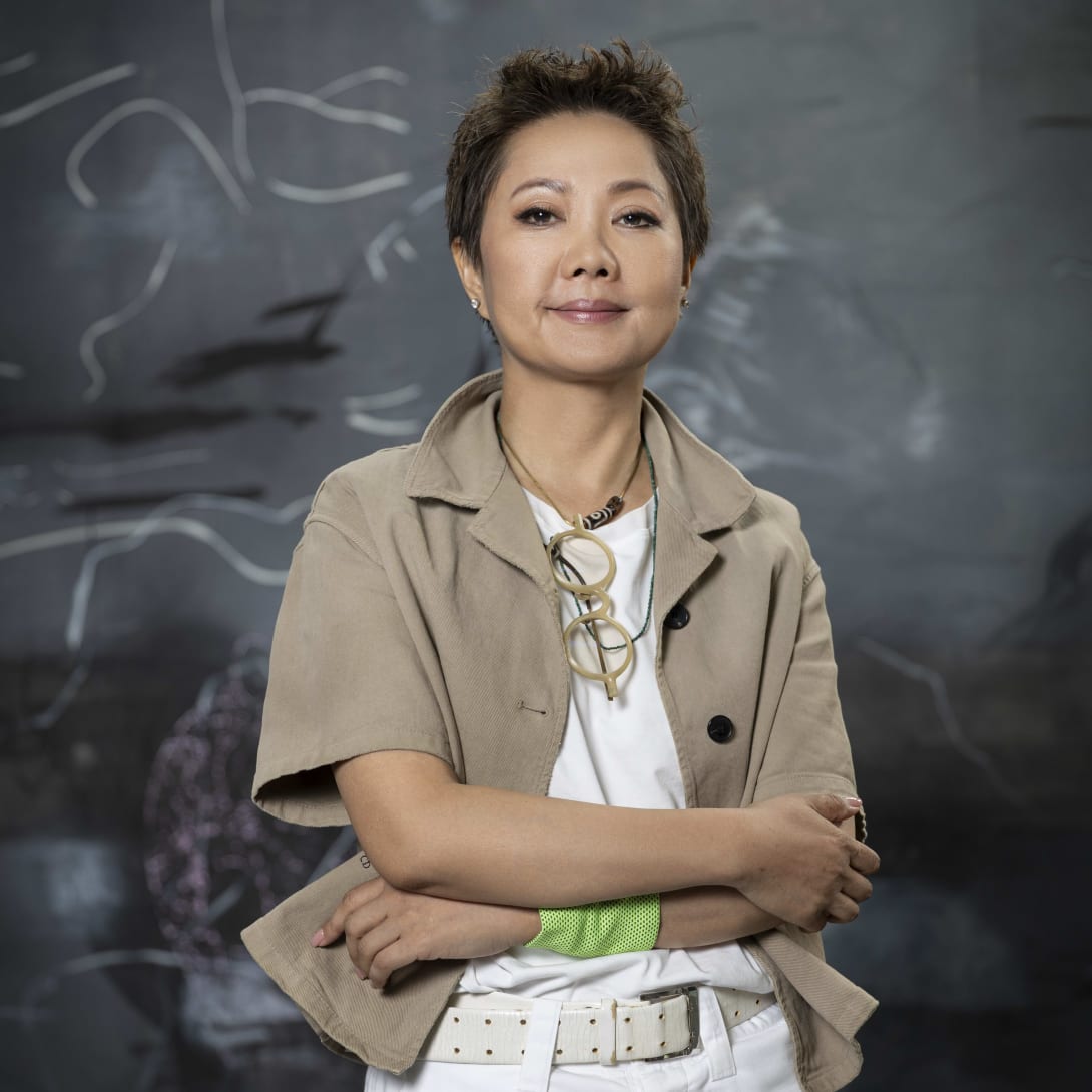 Contemporary artist Zhou Li, who collaborated on the Serpenti in Art project, in front of her painting.