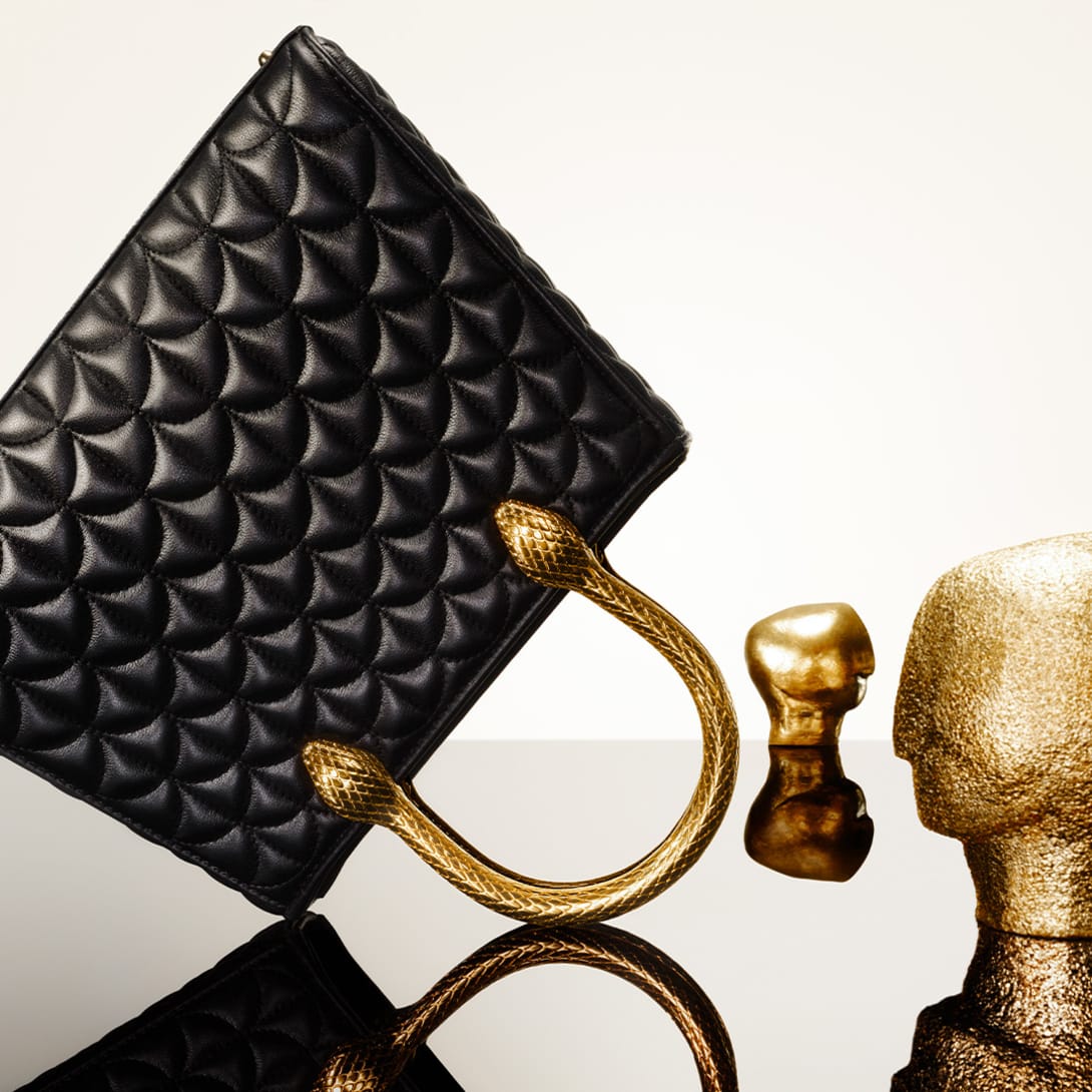 Serpentine Duo tote bag in calf leather with Calla matelassé motif and snake body-shaped handles.