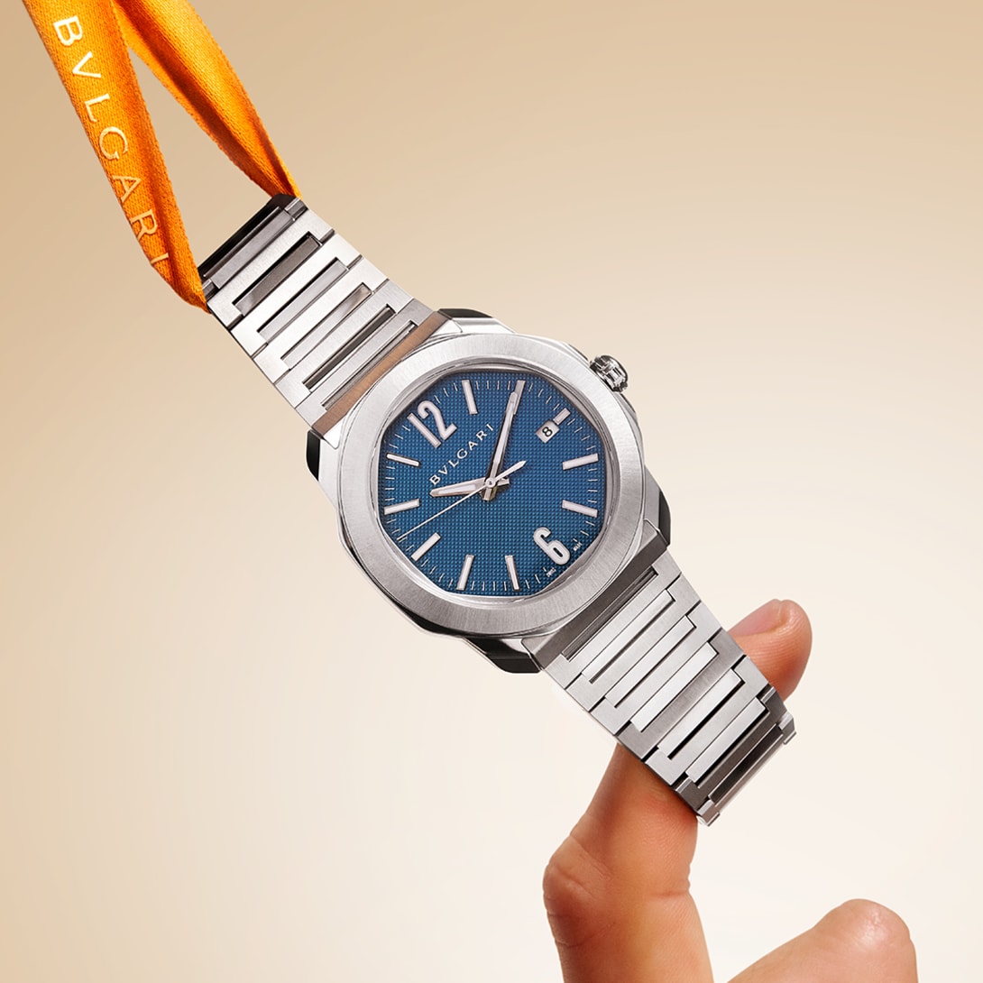 Octo Finissimo watch with ribbon. Creative image.