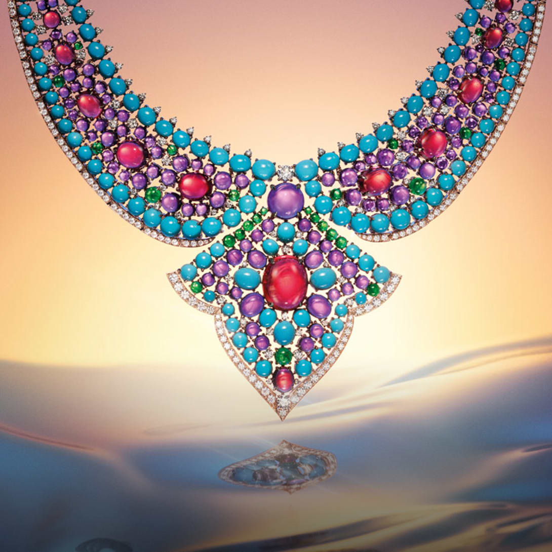 The Bvlgari Lotus Cabochon High Jewellery necklace with rubellite, emerald, turquoise and amethyst cabochon, close-up.