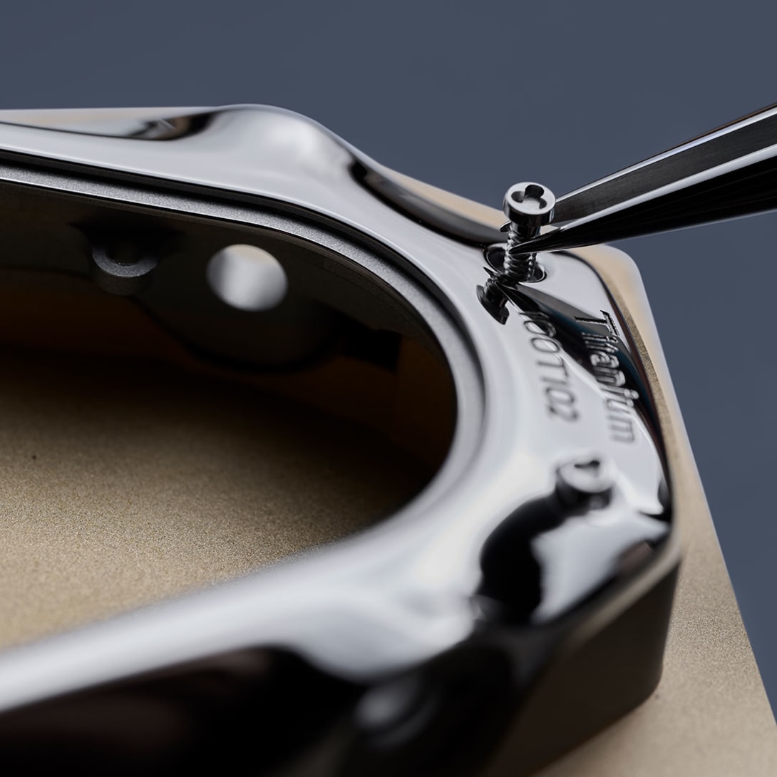 Unassembled Bvlgari x MB&F Serpenti watch case including five sapphire crystals and metal parts.