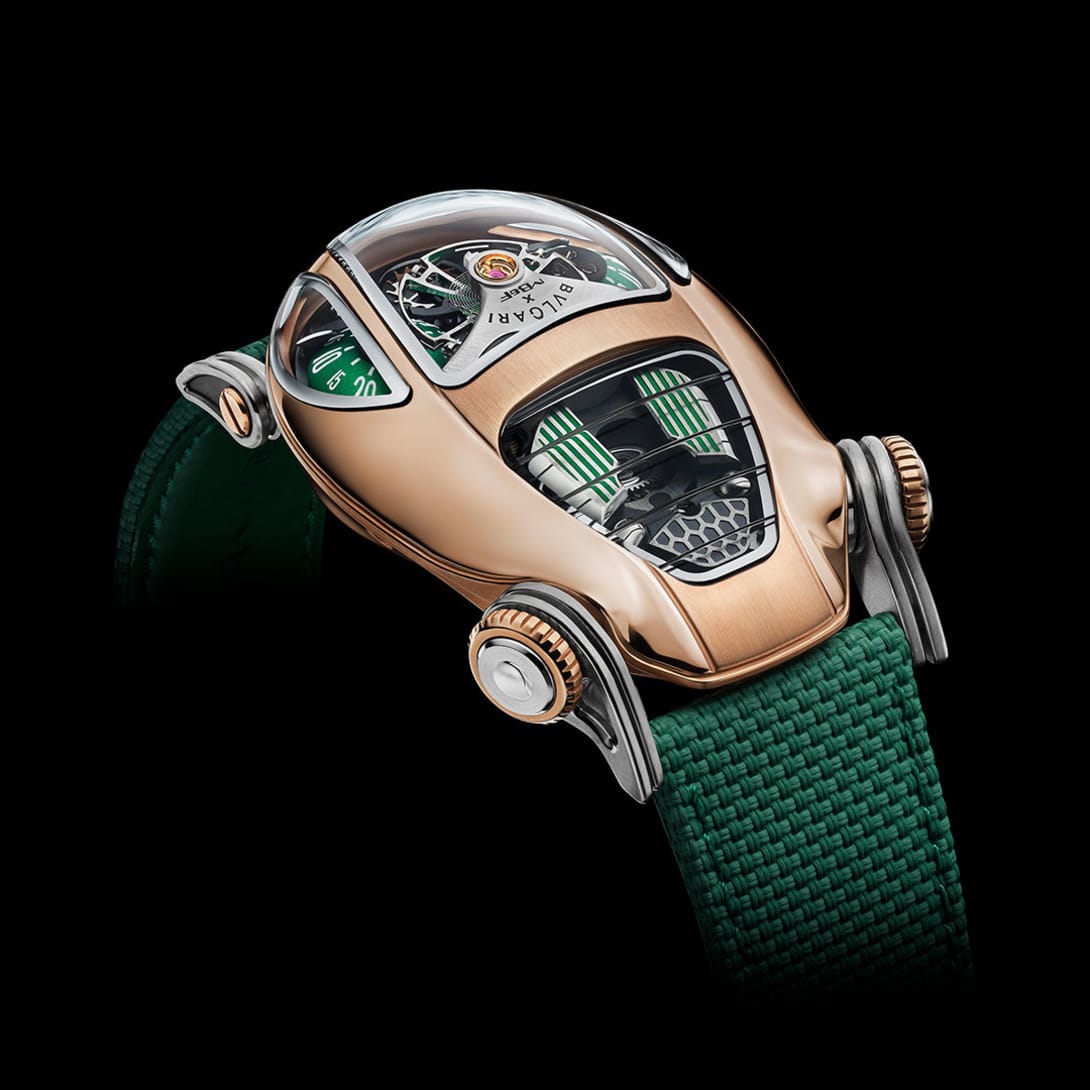 Bvlgari x MB&F Serpenti watch with black PVD-coated steel case, red domes and black rubber strap.