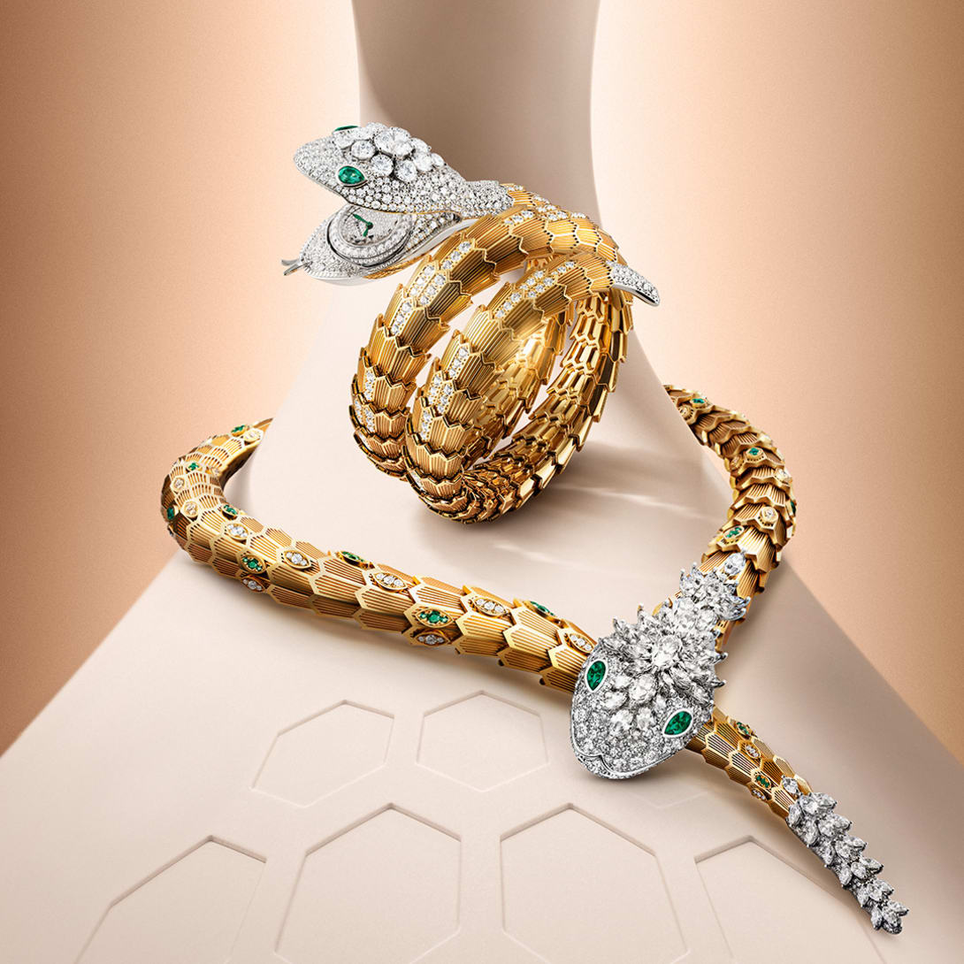Serpenti Misteriosi High Jewellery watch and necklace in yellow and white gold with diamonds on the head.