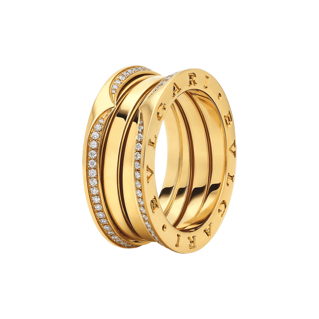 B.zero1 18 kt yellow gold three-band ring set with full pavé diamonds along its edges.