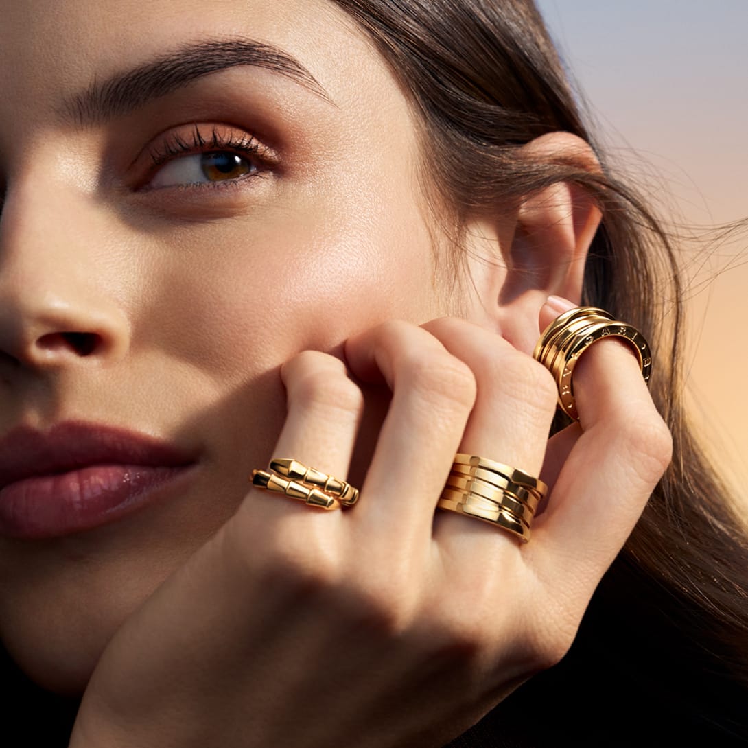 Moden waring B.zero1 and Serpenti rings.
