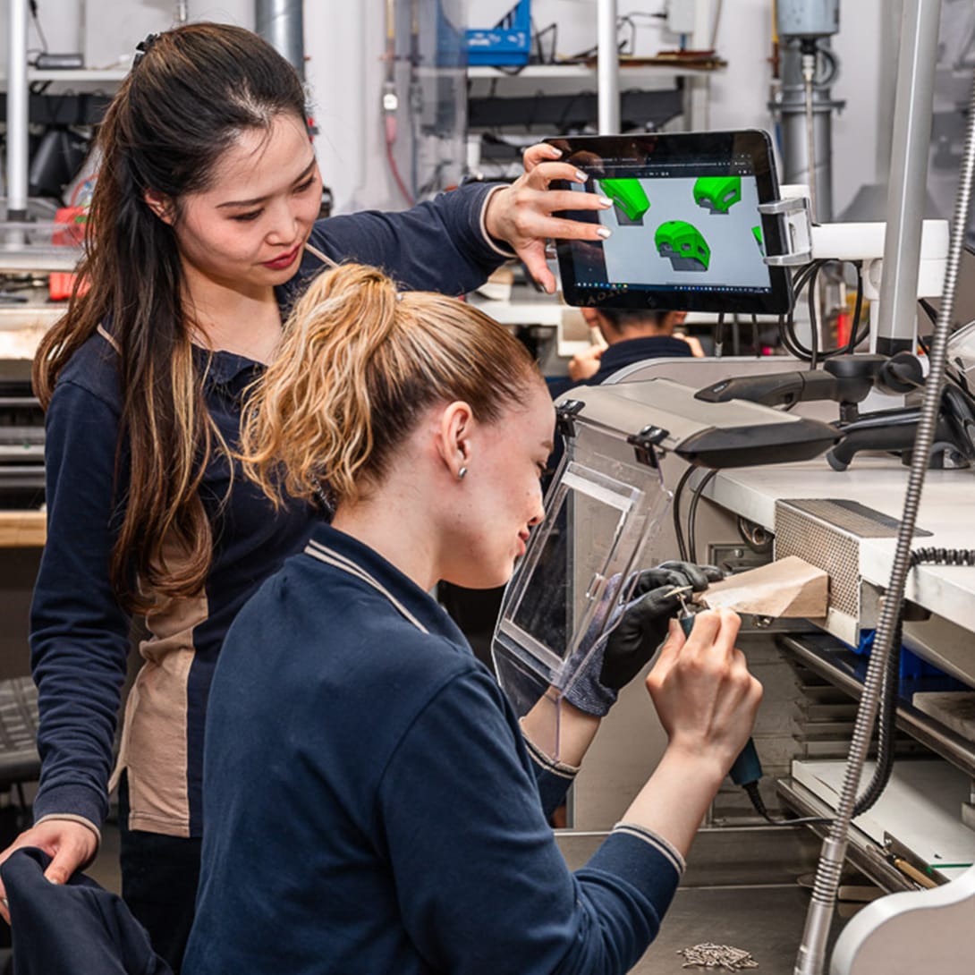 Craftswomen at work inside Bvlgari's jewellery manufacture site in Valenza.