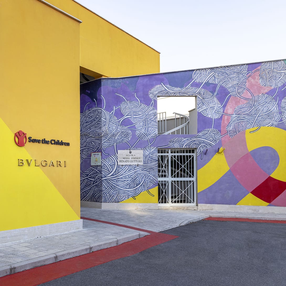 Bvlgari Deputy CEO Laura Burdese and Luciana Bonifacio, STC US, in front of Harvard Business School.