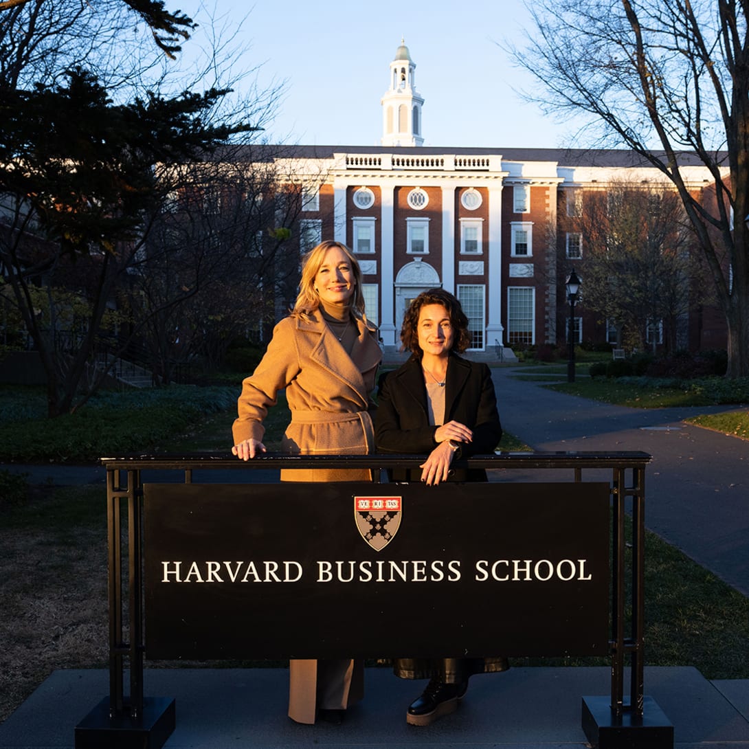 Bvlgari Deputy CEO Laura Burdese and Luciana Bonifacio, STC US, in front of Harvard Business School.