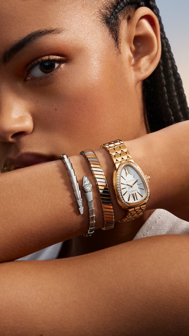 Model wearing Tubogas and Serpenti bracelets, and Serpenti seduttori watch.