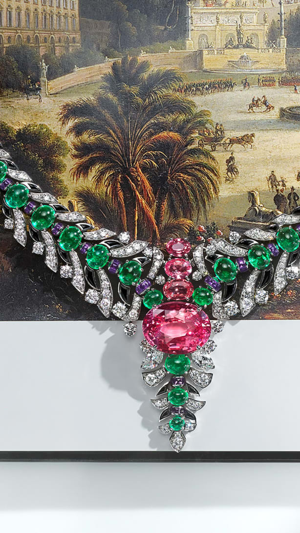 Secret Garden High Jewellery platinum necklace set with a Padparadscha sapphire, emeralds and diamonds.