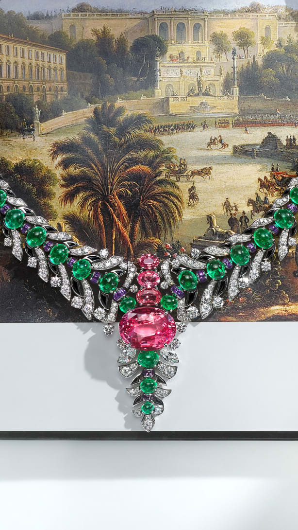 Secret Garden High Jewellery platinum necklace set with a Padparadscha sapphire, emeralds and diamonds.