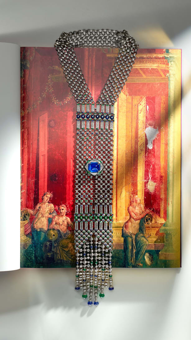 Seres Scarf High Jewellery white gold necklace set with a cushion sapphire, emeralds, sapphires and diamonds.