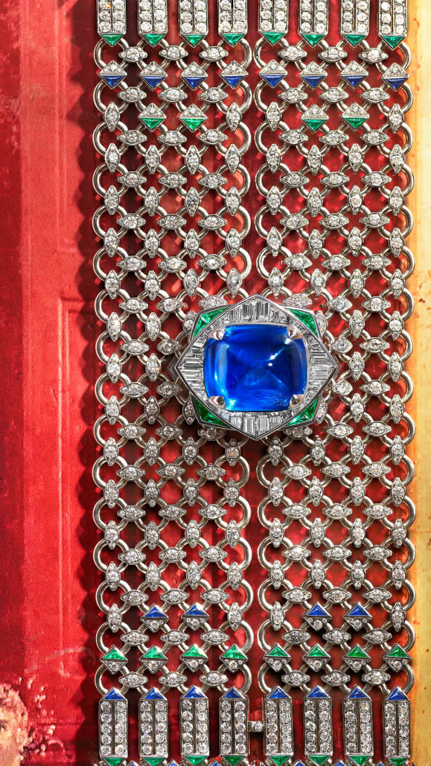 Seres Scarf High Jewellery white gold necklace set with a cushion sapphire, emeralds, sapphires and diamonds.