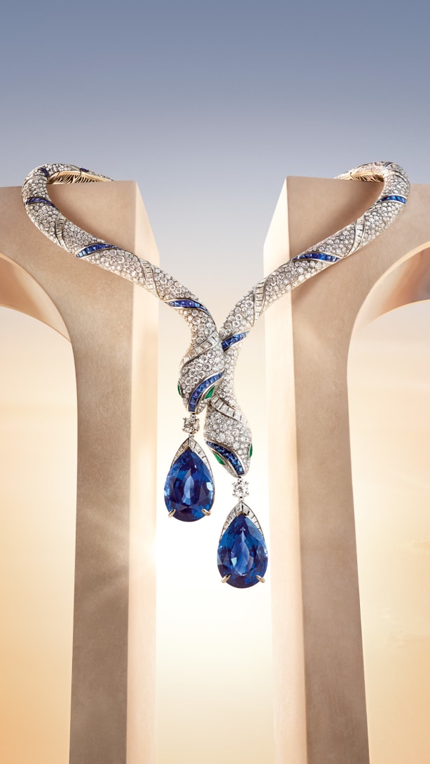The Serpenti High Jewellery sapphire and diamond necklace, Roman architectural elements and the sky at dawn.