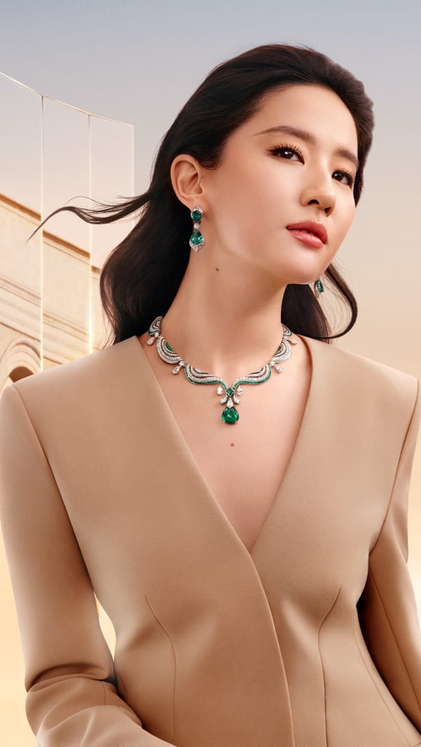 Liu Yifei wearing Aeterna High Jewellery necklace and earrings, Rome in the background, the sky at dawn.