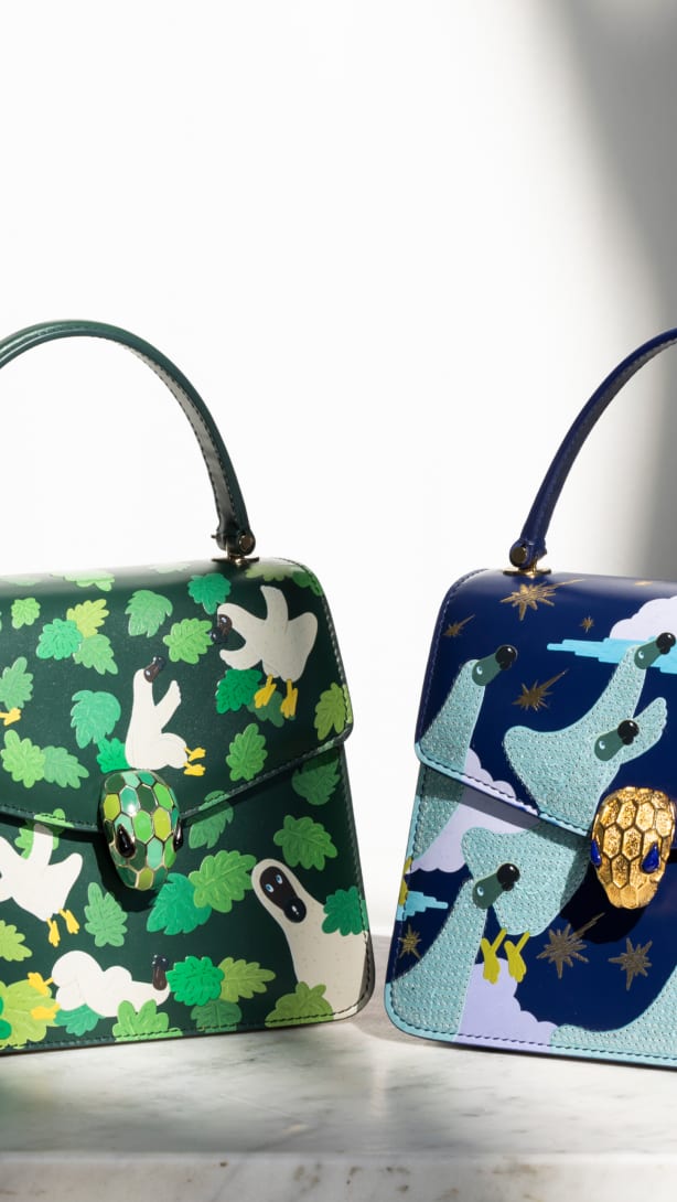 Serpenti Forever Top Handle bags in green and blue calf leather, designed by artist Sunwoo Kim.