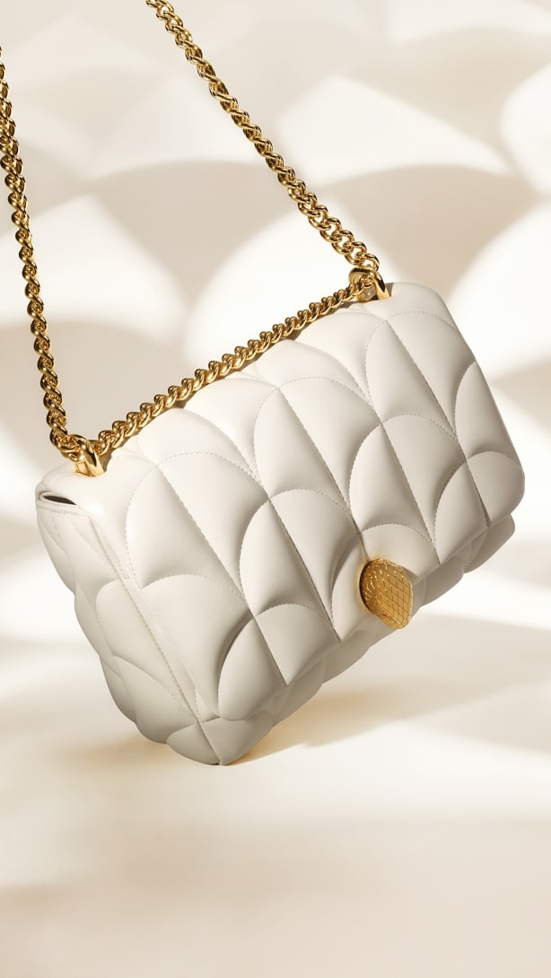 Serpenti Sugarloaf white calf leather shoulder bag with Calla Matelassé motif and snakehead closure.