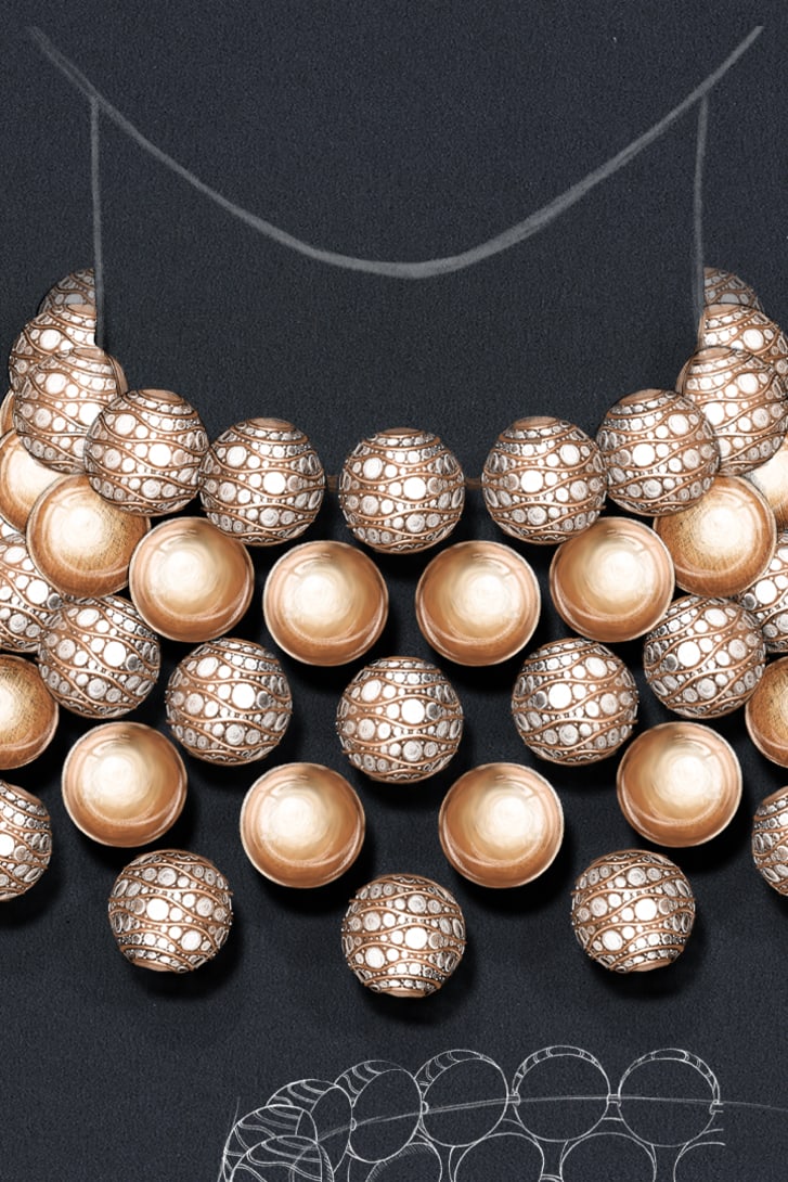 Aurea Chandra High Jewellery necklace with hollow gold sphere, close-up.