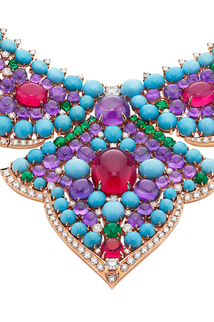 The Bvlgari Lotus Cabochon High Jewellery necklace with rubellite, emerald, turquoise and amethyst cabochon, close-up.