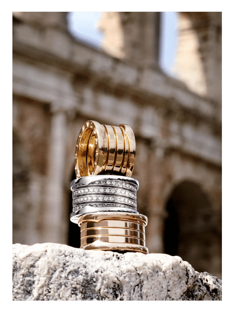 B.zero1 rings in yellow gold, white gold with diamonds and rose gold. Rome in the background.