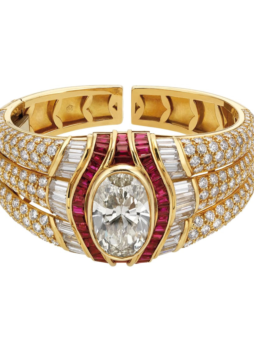 Bangle in gold with rubies, fancy yellow diamond and diamonds, 1987. Bvlgari Heritage Collection