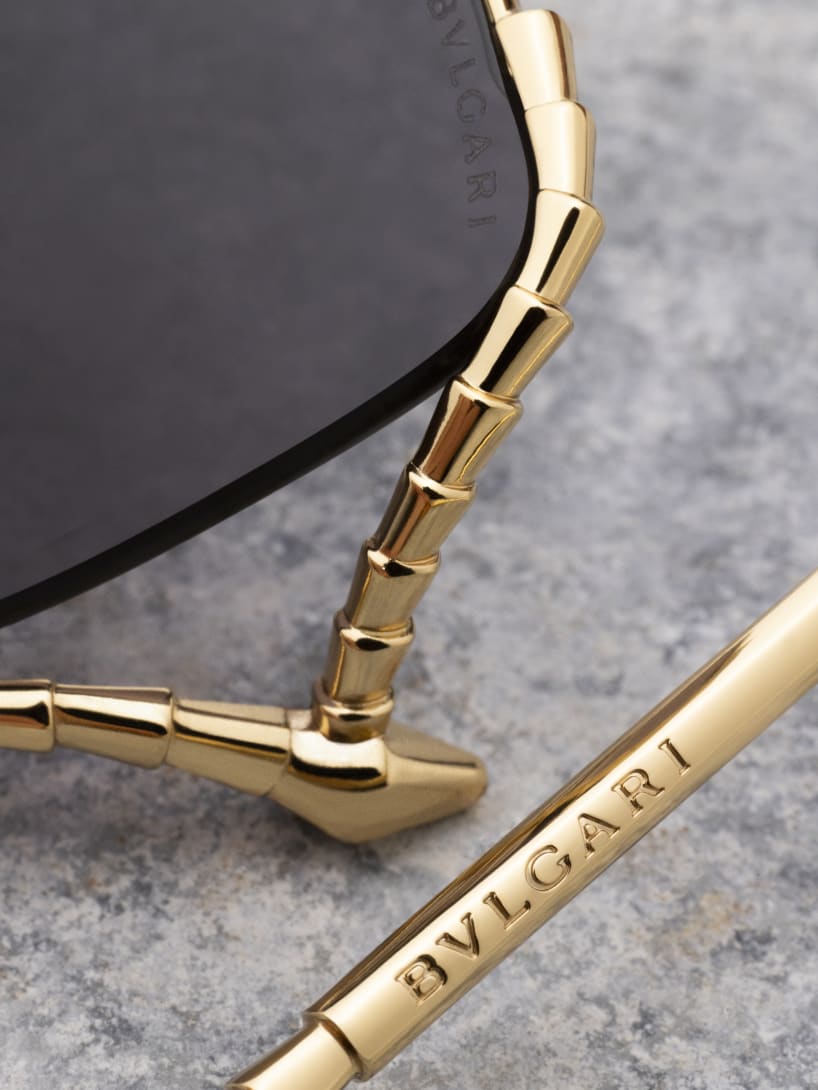 Serpenti Viper rectangular sunglasses with jewellery-inspired scale motif on the temples.
