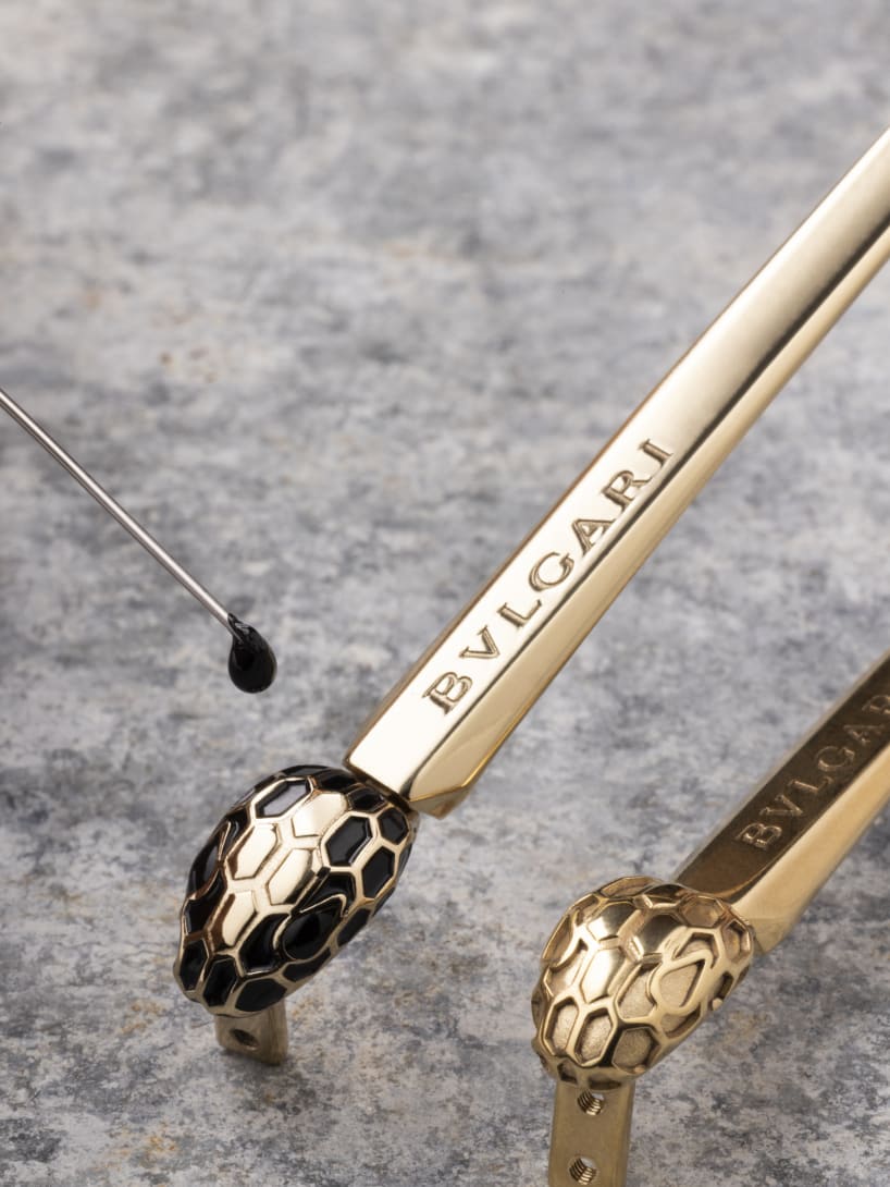 Making of Serpenti Viper glasses, polishing of the metallic snake scale-inspired temples, close up.