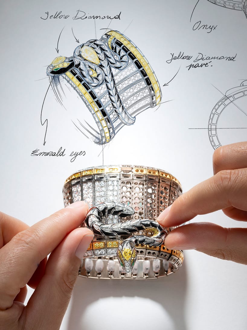 Making of Serpenti Spira High Jewellery white gold cuff with diamonds and onyx, sketch behind.