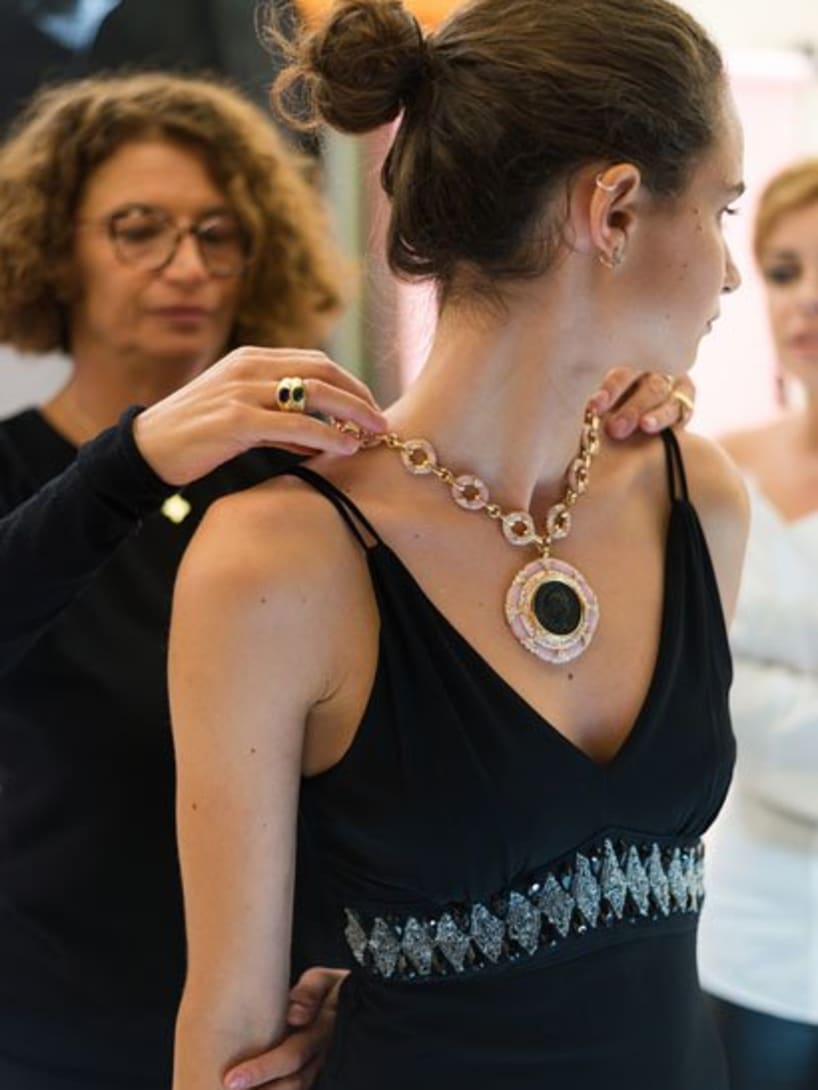 Image representing a model wearing Bvlgari necklace.