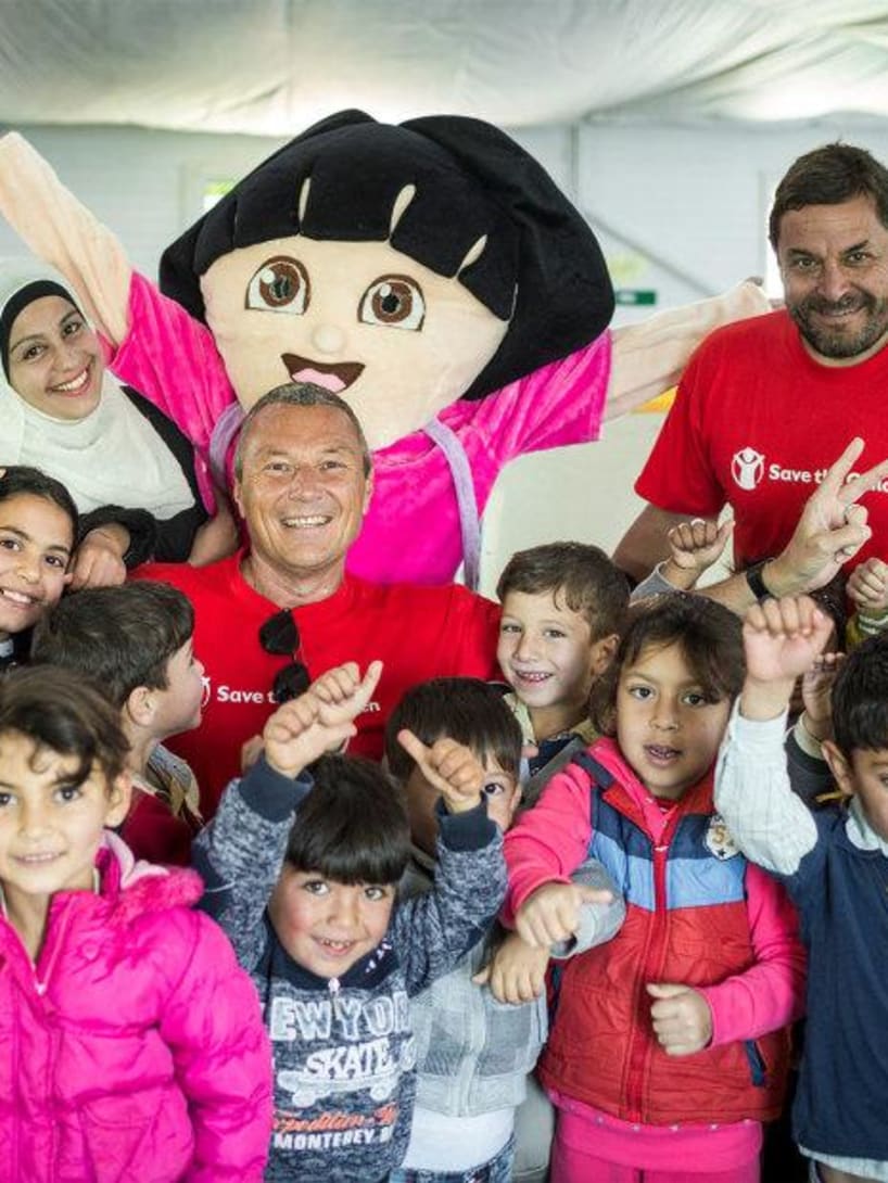 Bvlgari CEO, Jean-Christophe Babin with some kids from Za’atari refugee camp.