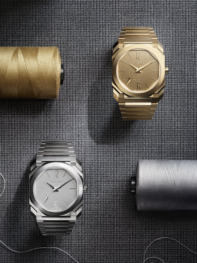 Octo Finissimo Automatic 37 mm watches in titanium and yellow gold beside matching coils.
