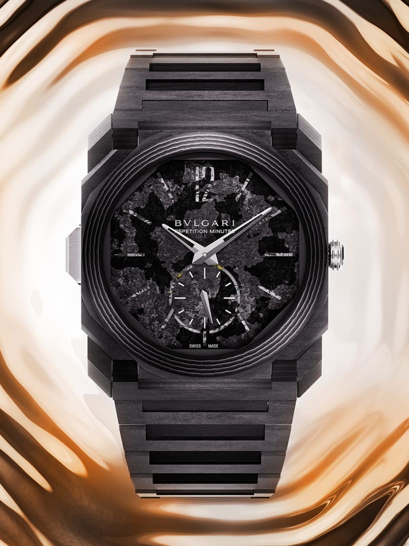 Octo Finissimo Minute Repeater ultra-thin chiming watch in black carbon with black dial, creative shot.