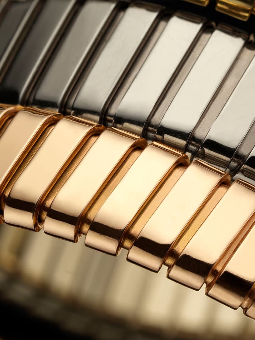 Close up of the rose, white and yellow gold Tubogas coils of a Bulgari creation.