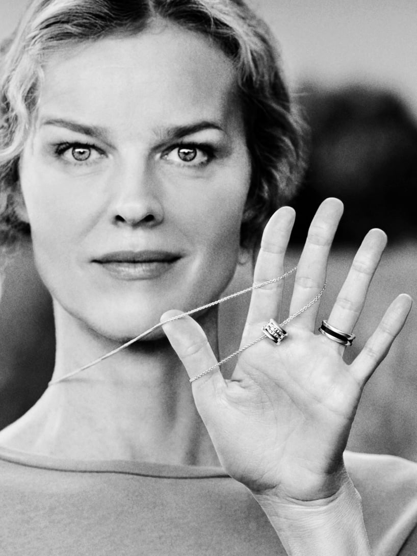 Eva Herzigova with open hand wearing Bulgari and Save the Children jewelry for the dedicated campaign.