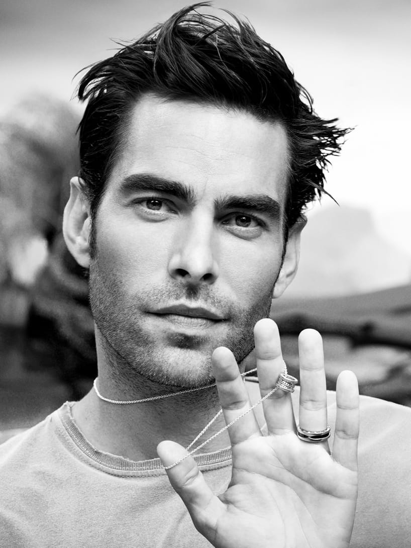 Jon Kortajarena with open hand wearing Bulgari and Save the Children jewelry for the dedicated campaign.
