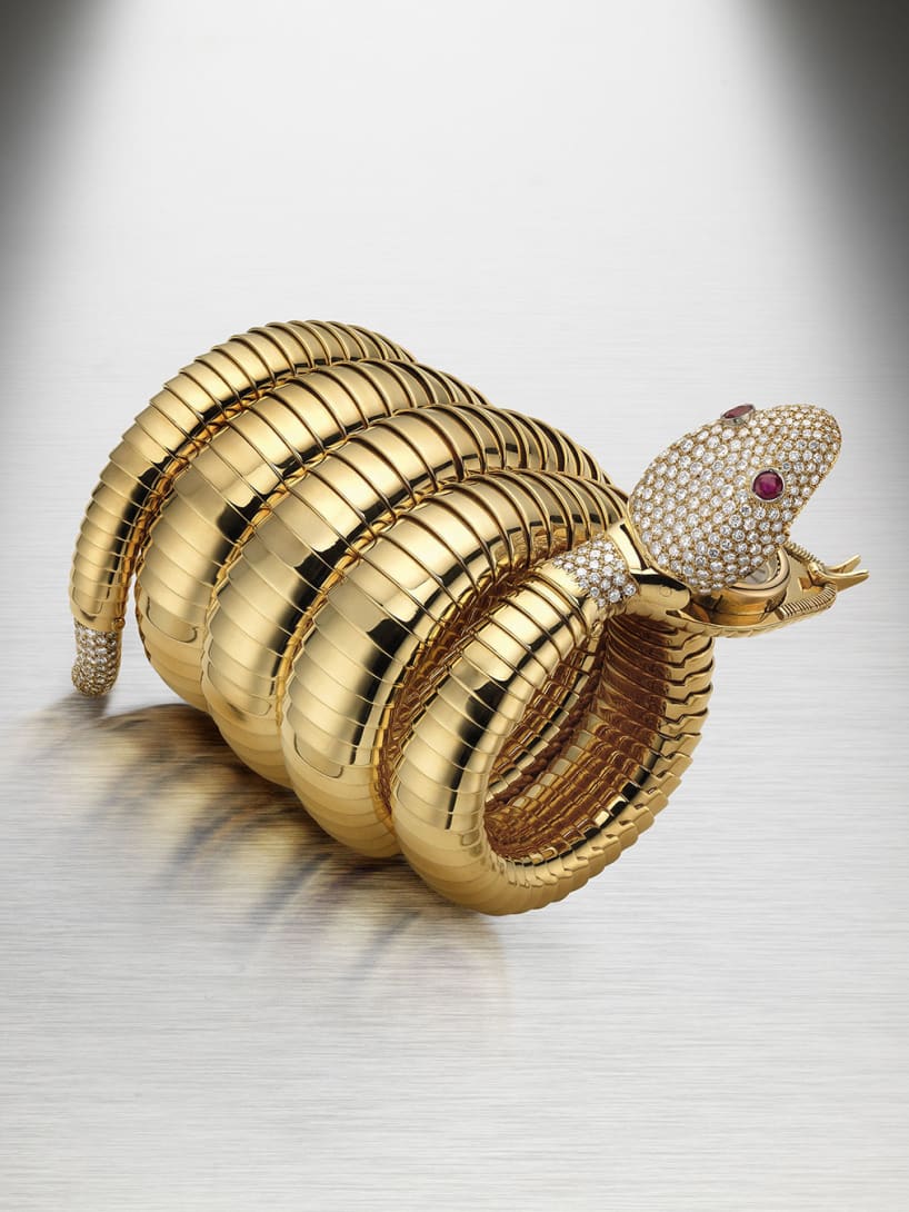 Serpenti Tubogas bracelet-watch in gold with rubies and diamonds