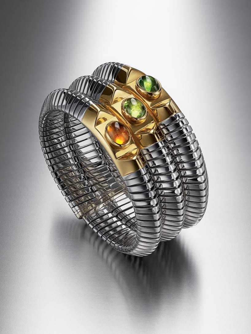 Tubogas bracelet in steel and gold with citrines and green tourmaline